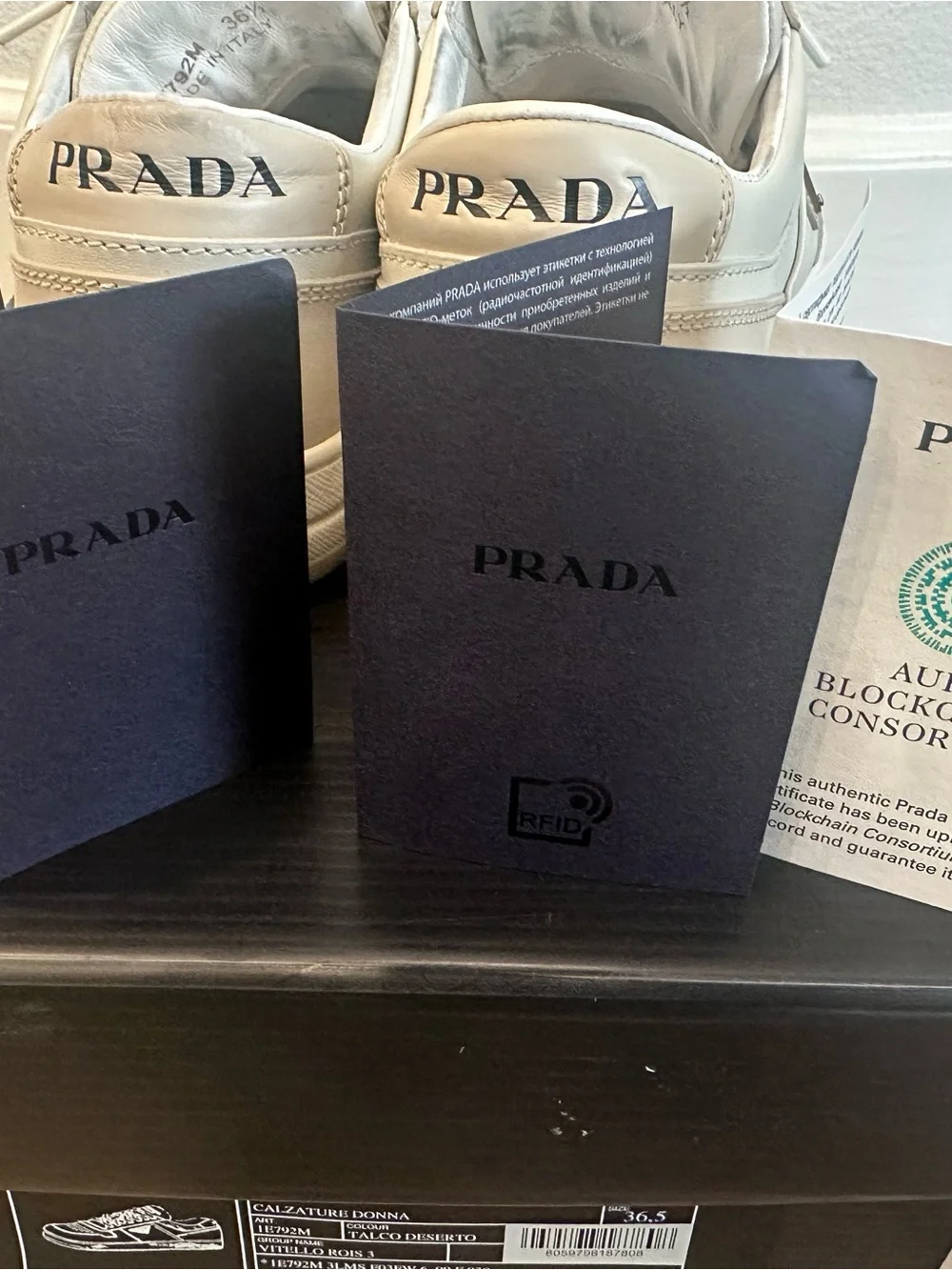 Prada Women’s Off-White Leather Low-Top Sneakers